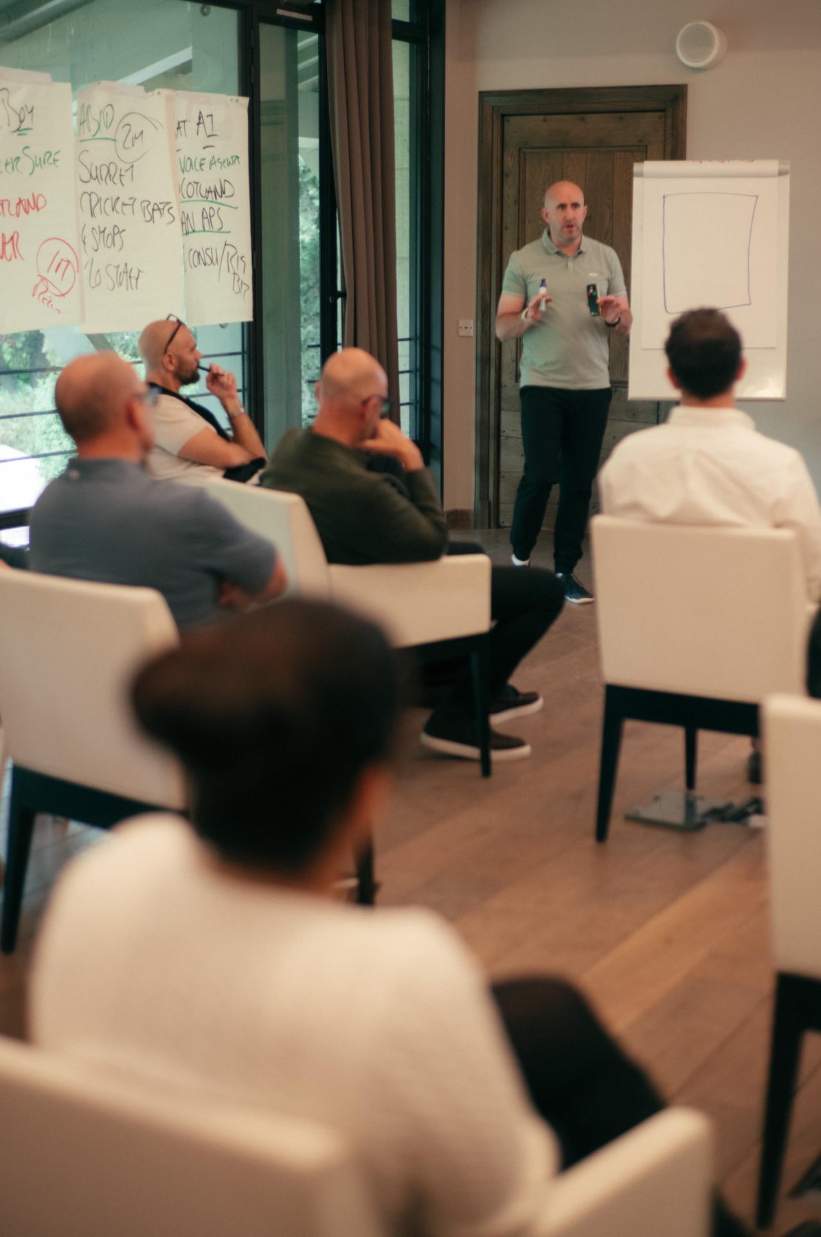 Matt Harmsworth running an AI training workshop with business owners
